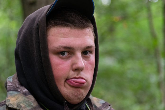 Chunk sticking his tongue out